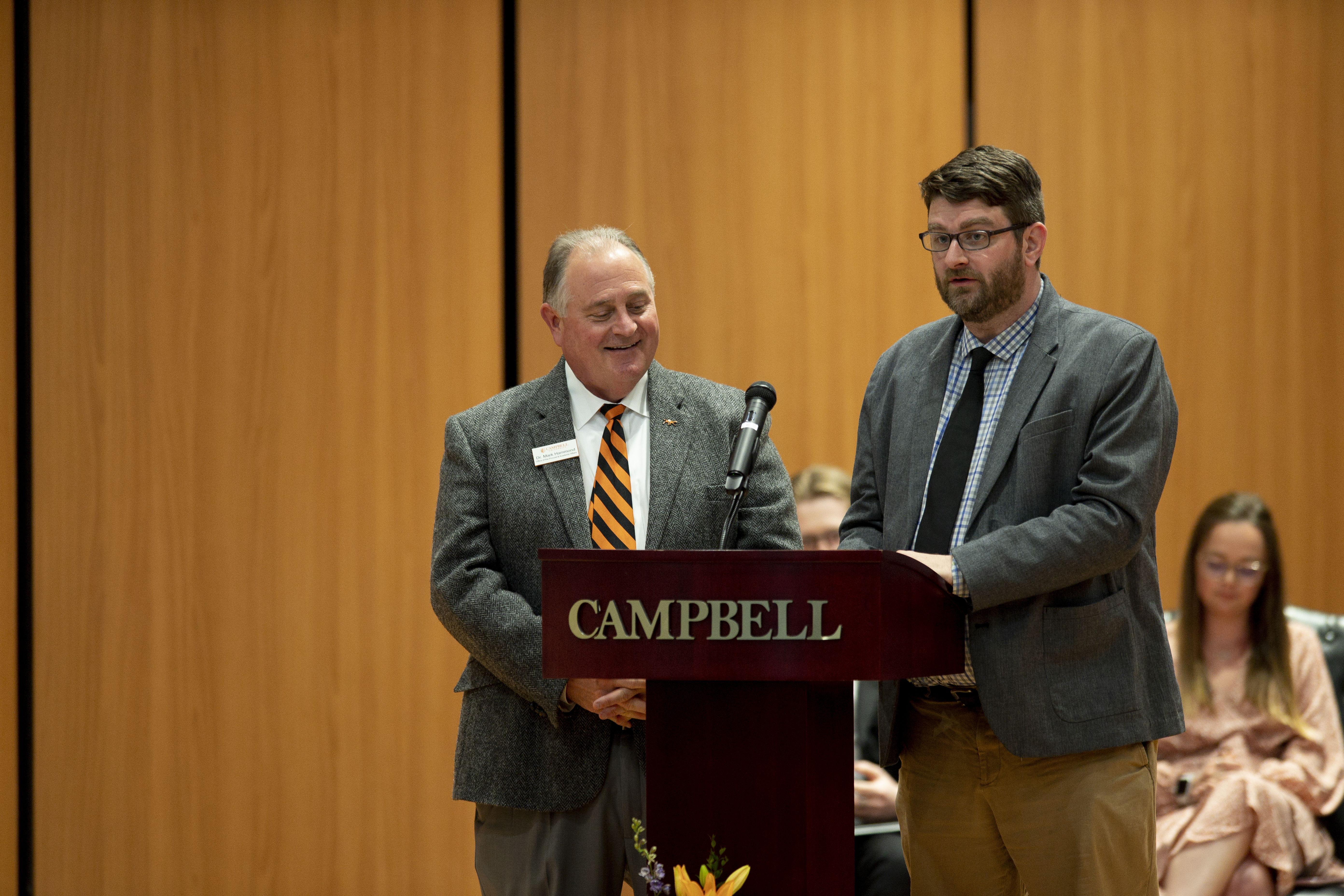 Provost and Symposium Committee Chair present awards