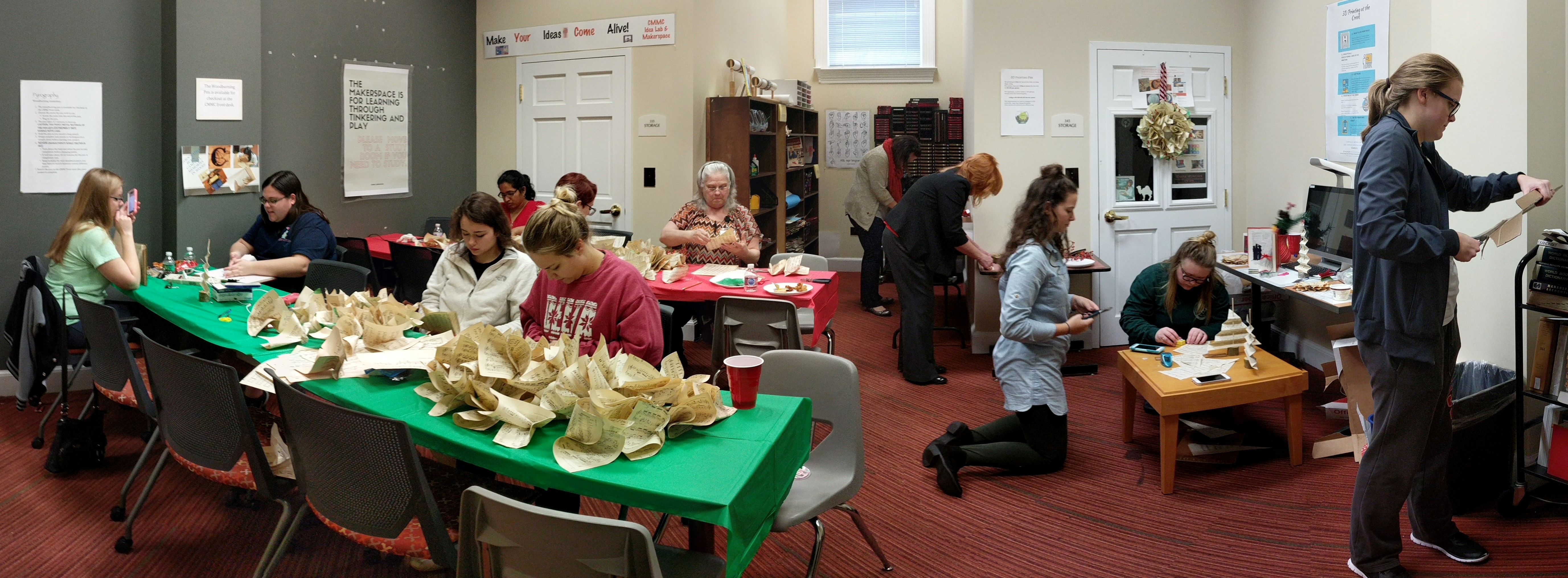 Group of students working on their crafts with books projects