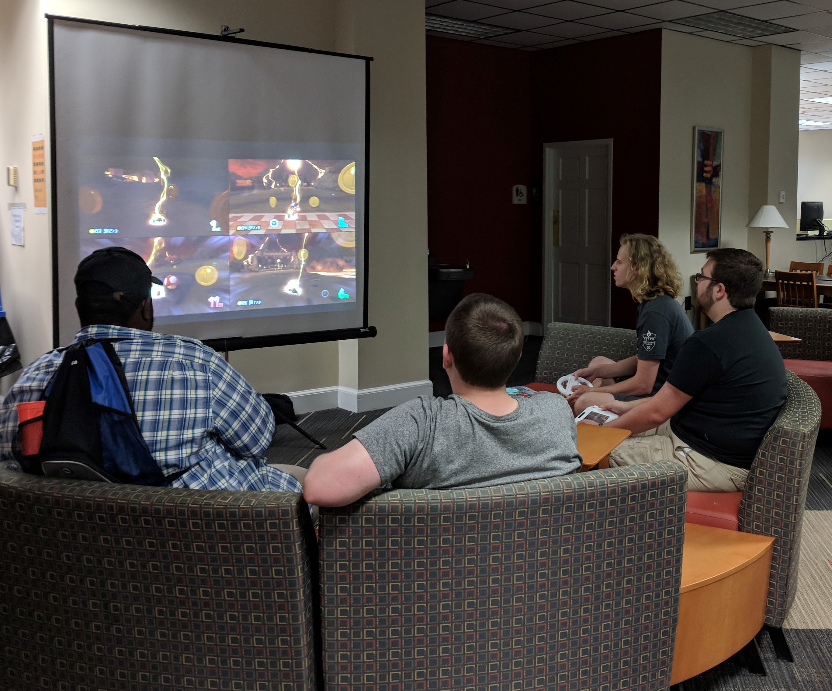 Group of students playing a video game